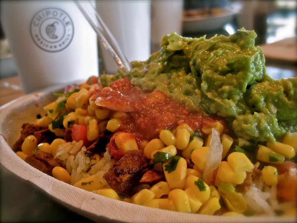 Chipotle Chipotle — 1/2 steak 1/2 chicken bowl, corn, guac… Flickr