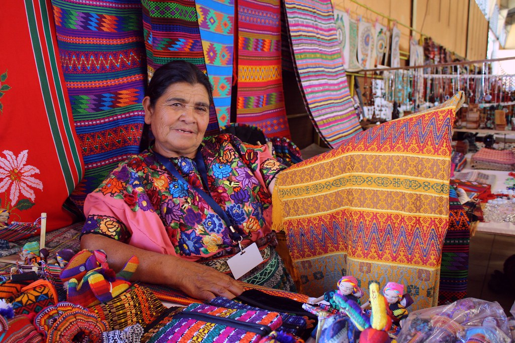 People of Guatemala A Guatemalan blanket vendor gives me h… Flickr
