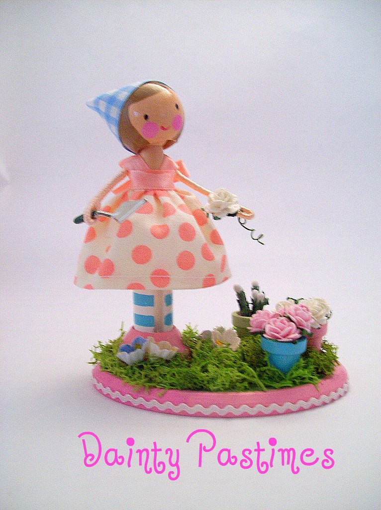 Garden gal one of my little dollies,in her tiny garden sonia jones