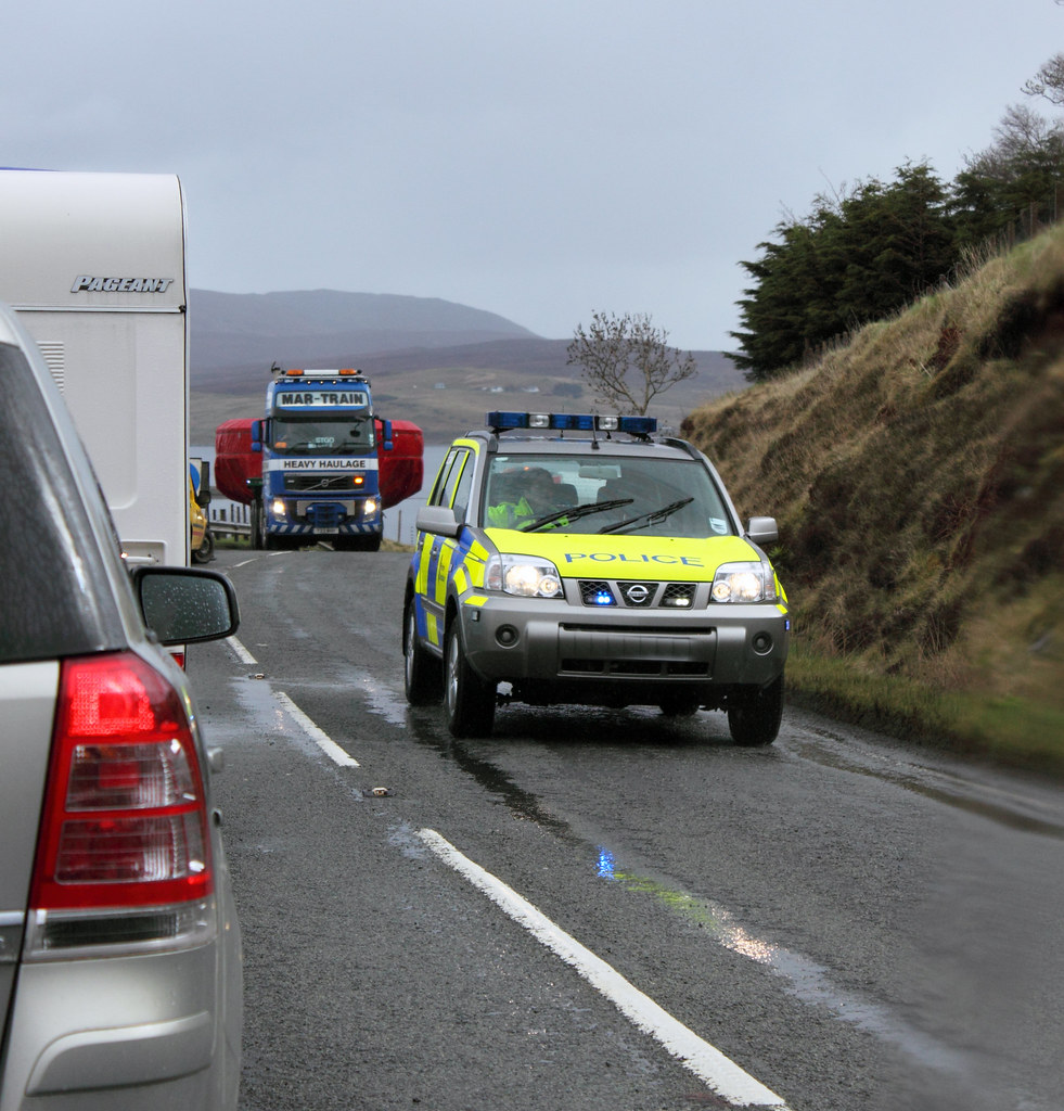 Police escort. Police escort a convoy of wide loads throug… Flickr