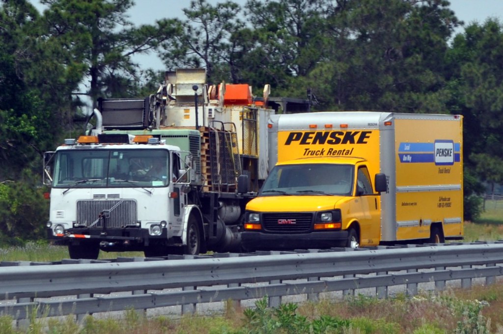 Volvo WXLL (Highway Line Painting Truck) and Penske GMC Box Truck a