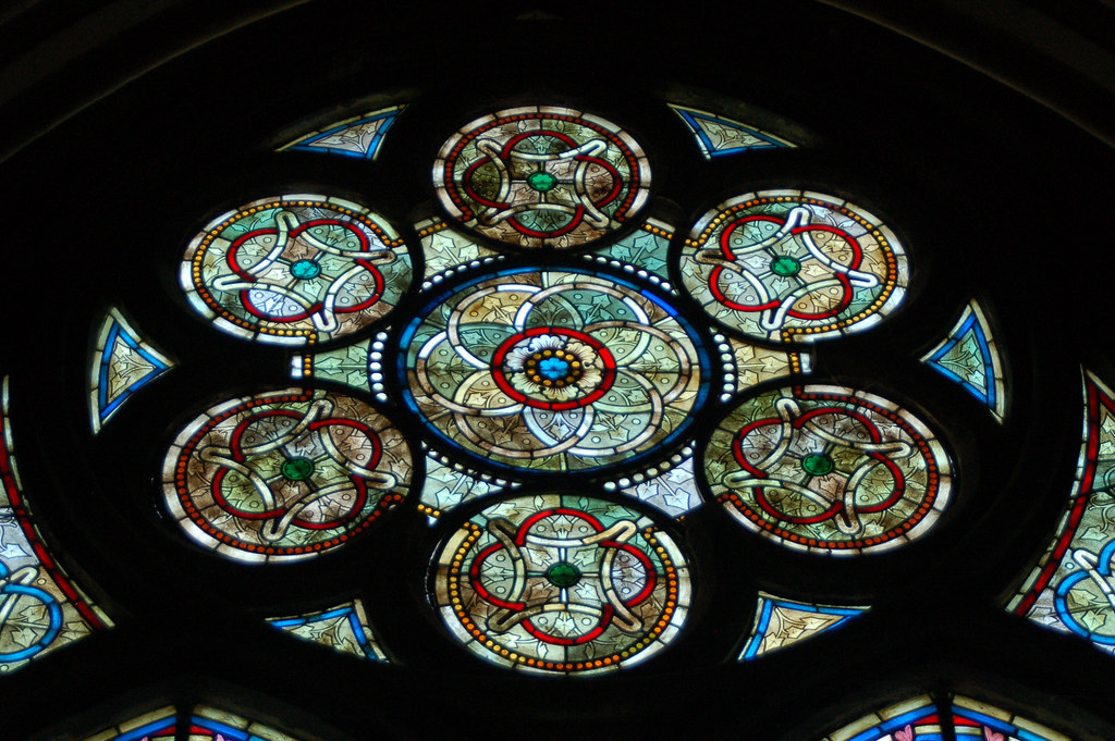 Round stained glass window with quatrefoil circles within Flickr