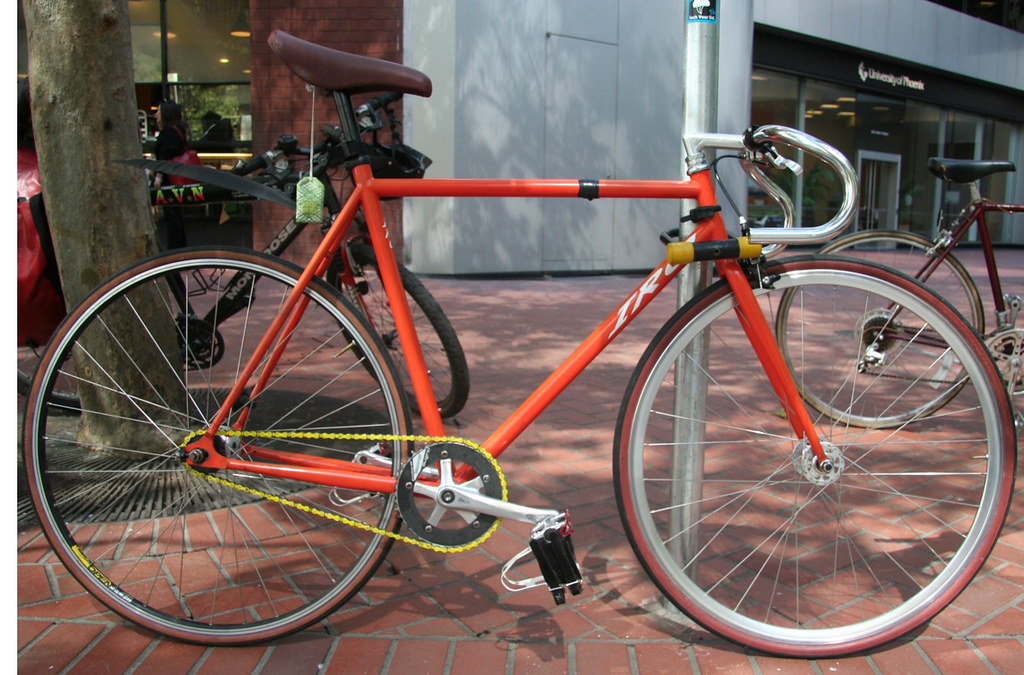 San Francisco Messenger Bike Orange messenger bike with ye… Flickr