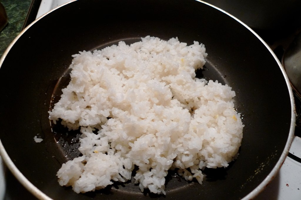 start frying cooked rice w a tablespoon of sesame oil, the… Flickr