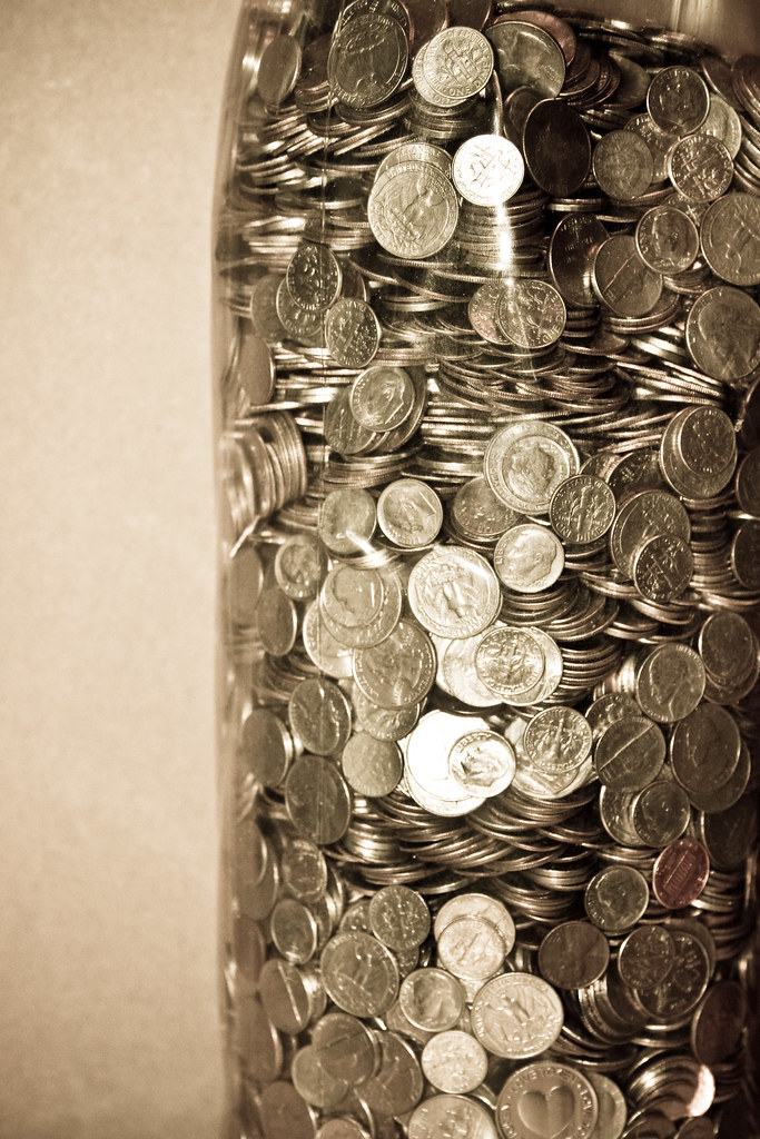 Bottle of Coins I discovered today the change we have been… Flickr