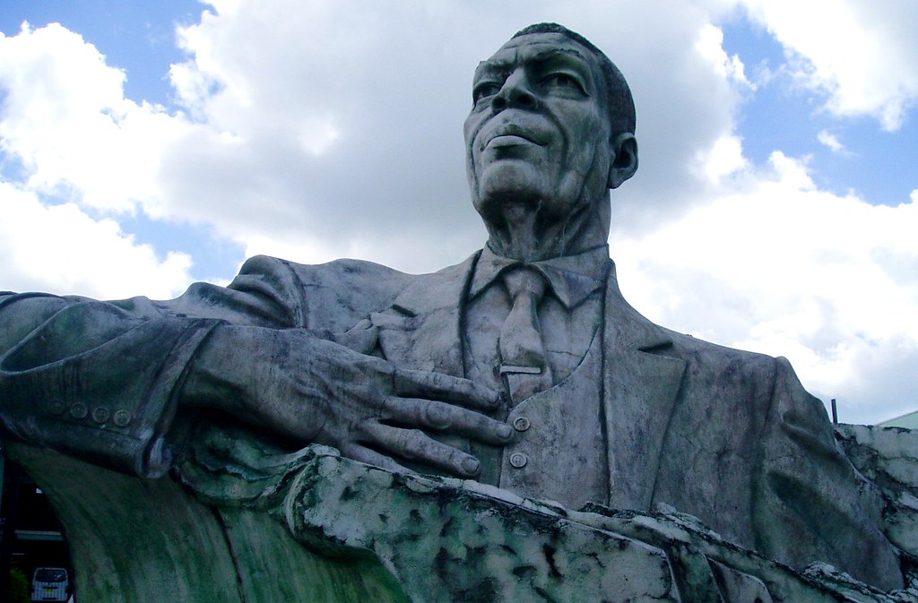 Antigua park statue Jim McCluskey Flickr