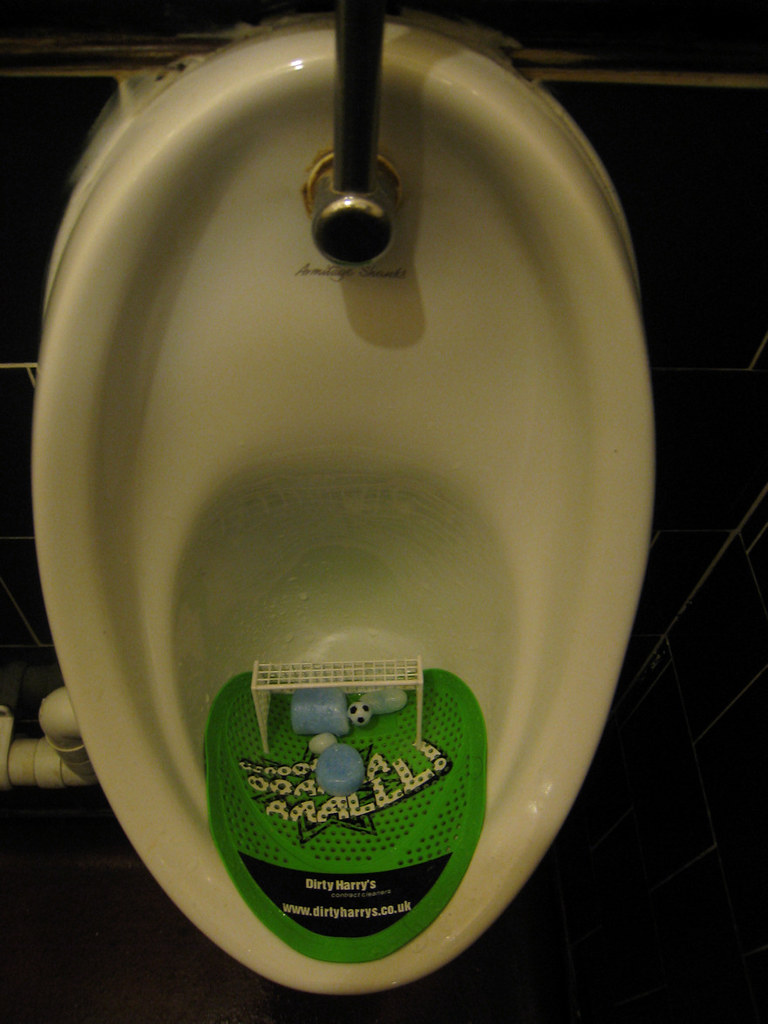 Urinal Football Bizarre ball and net game in the pisser at… Flickr
