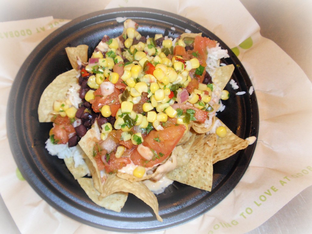 365015 Friday night at Qdoba. Vegetarian nachos with blac… Flickr