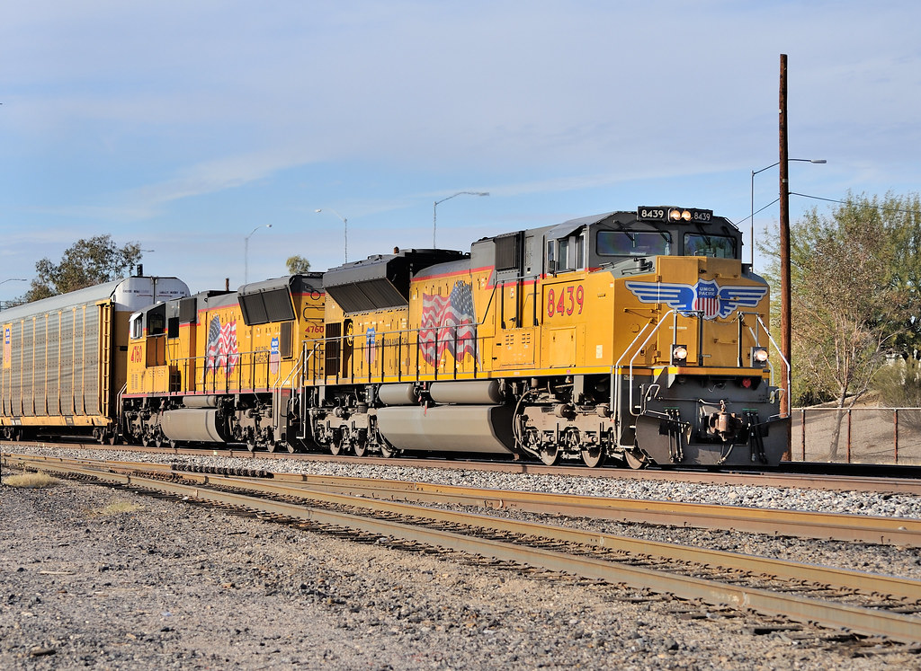 UP EMD SD70ACe 8439 and SD70M 4760 with an eastbound freight train