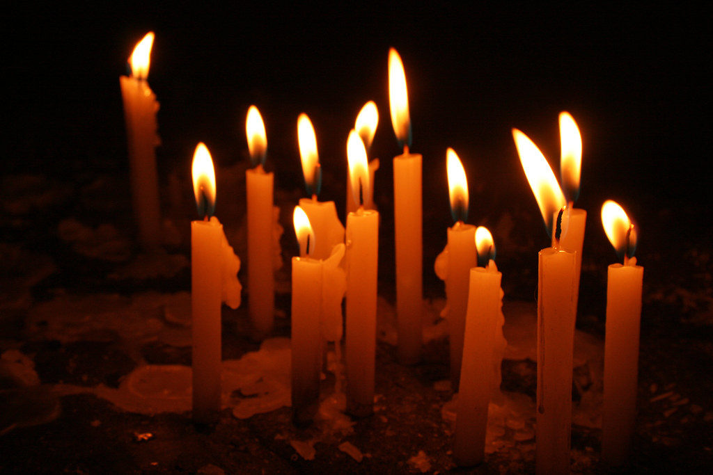 Candles The candles were lit on a huge, mainly empty table… Flickr