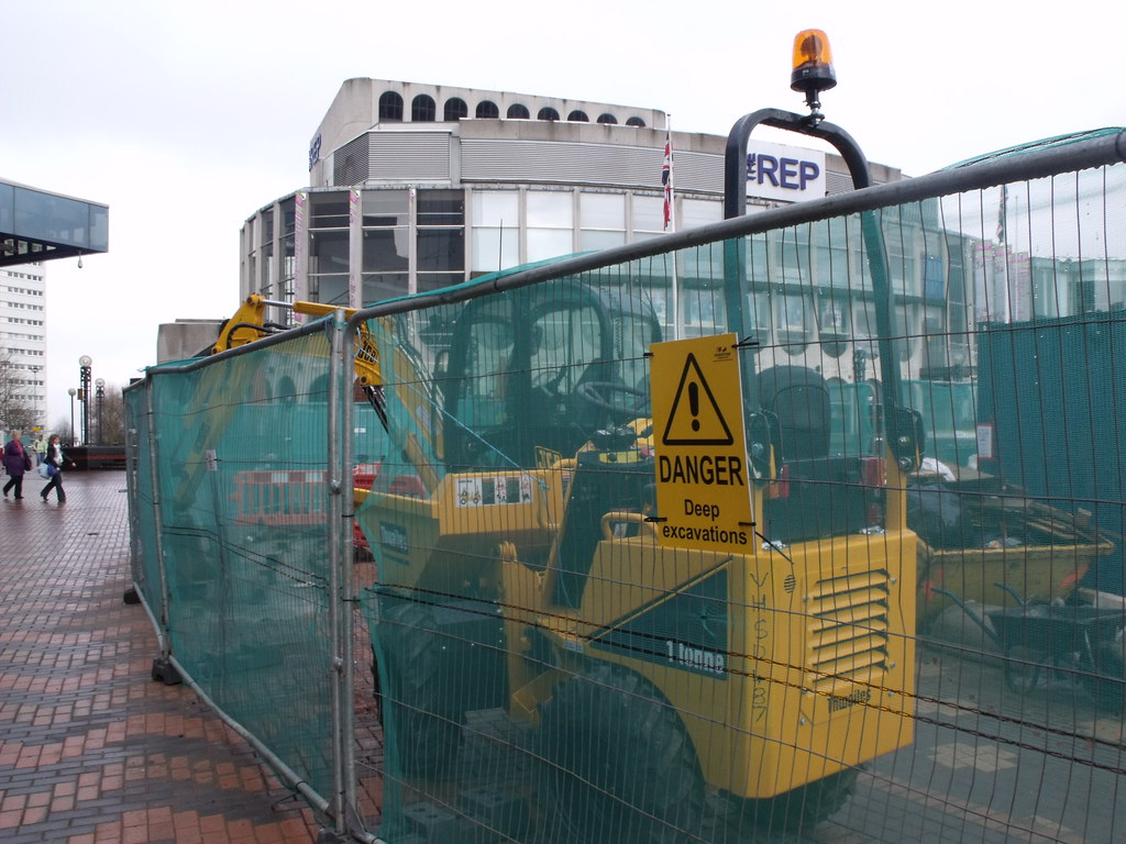 Deep excavation in Centenary Square JCB 8045 and Thwaites a photo