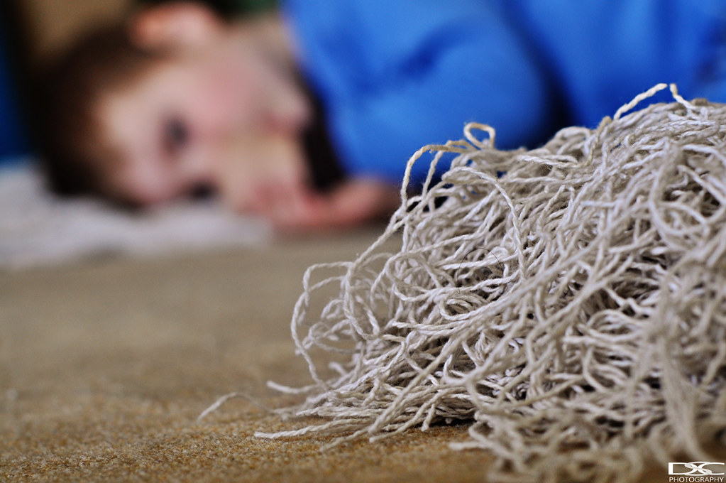 Threads of a Blanket His blanket is slowly falling apart. … Flickr