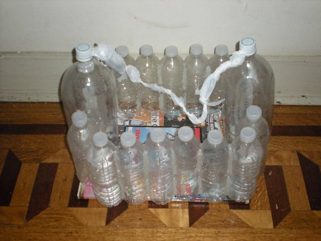 Step 3 Hot glue bottles together to form a rectangular sha… Flickr