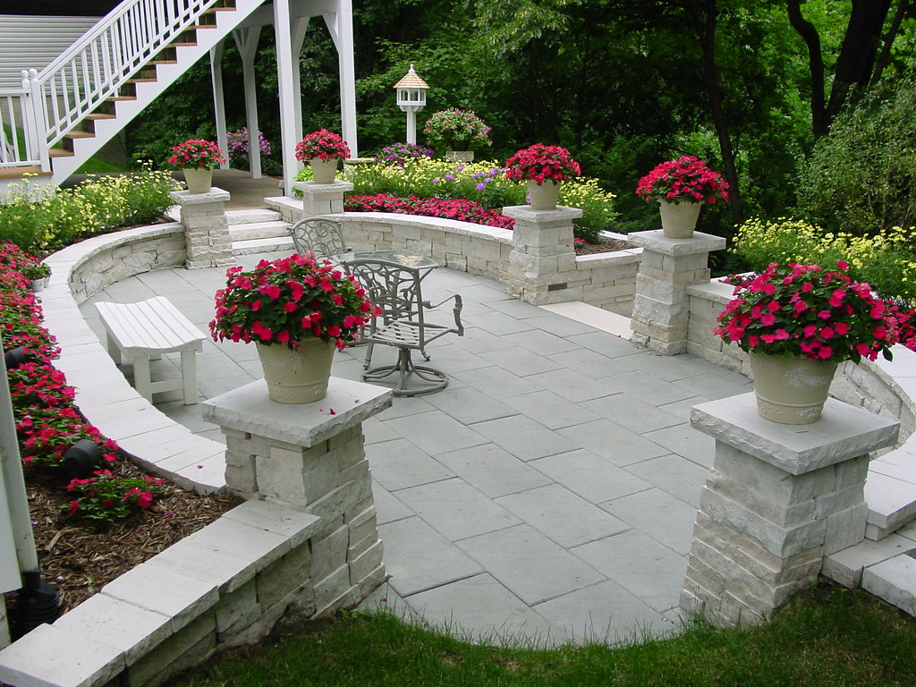White Stone Wall Formal patio with Waukesha White sitting