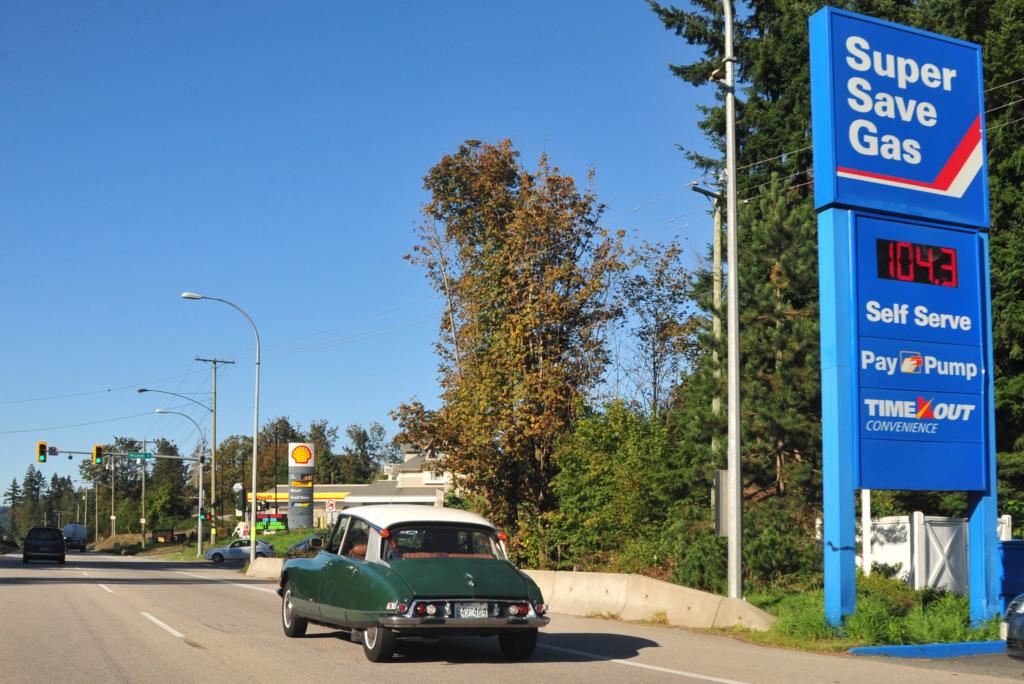 Citroën DS and Super Save Gas Station The Citroën DS was a… Flickr