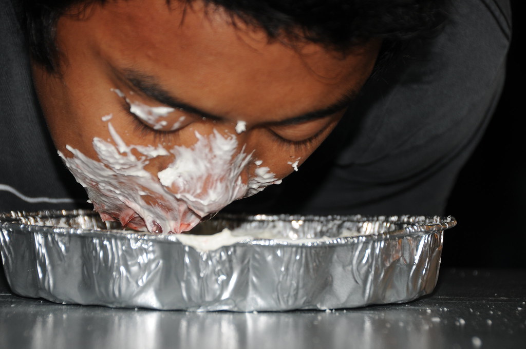 A pie eating contest was one of the many contests held dur… Flickr