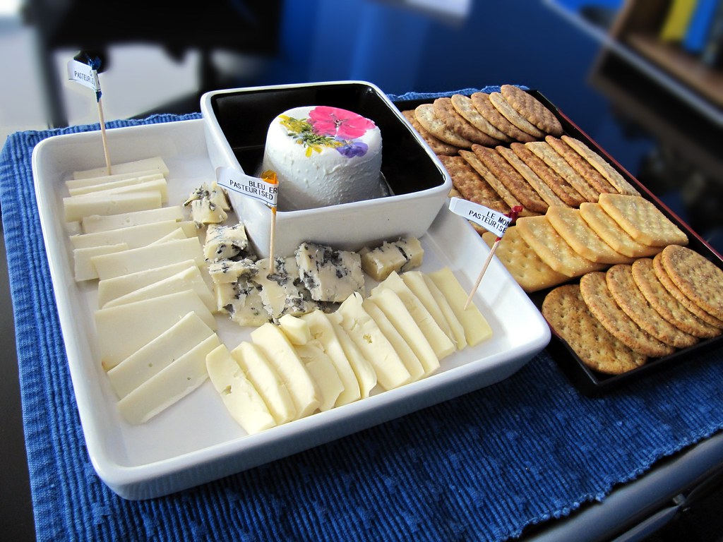 Cheese and crackers anyone? An assortment of cheese and cr… Flickr