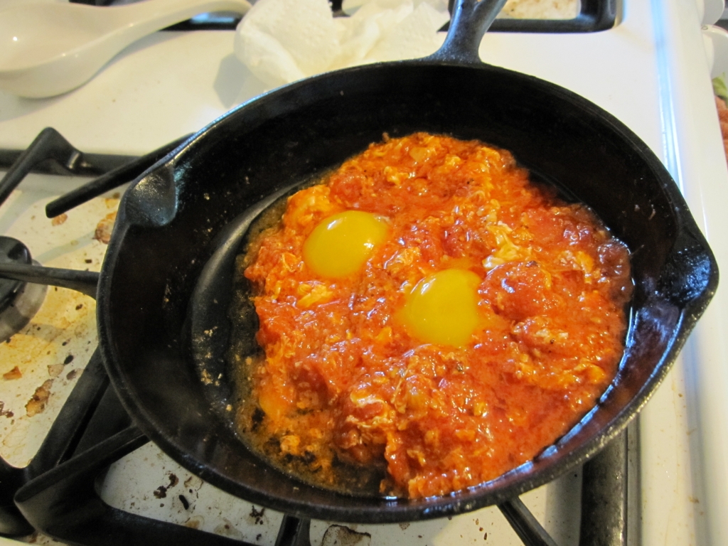 Tomatoes with Eggs on Toast Cooking the egg yolks in the s… Flickr