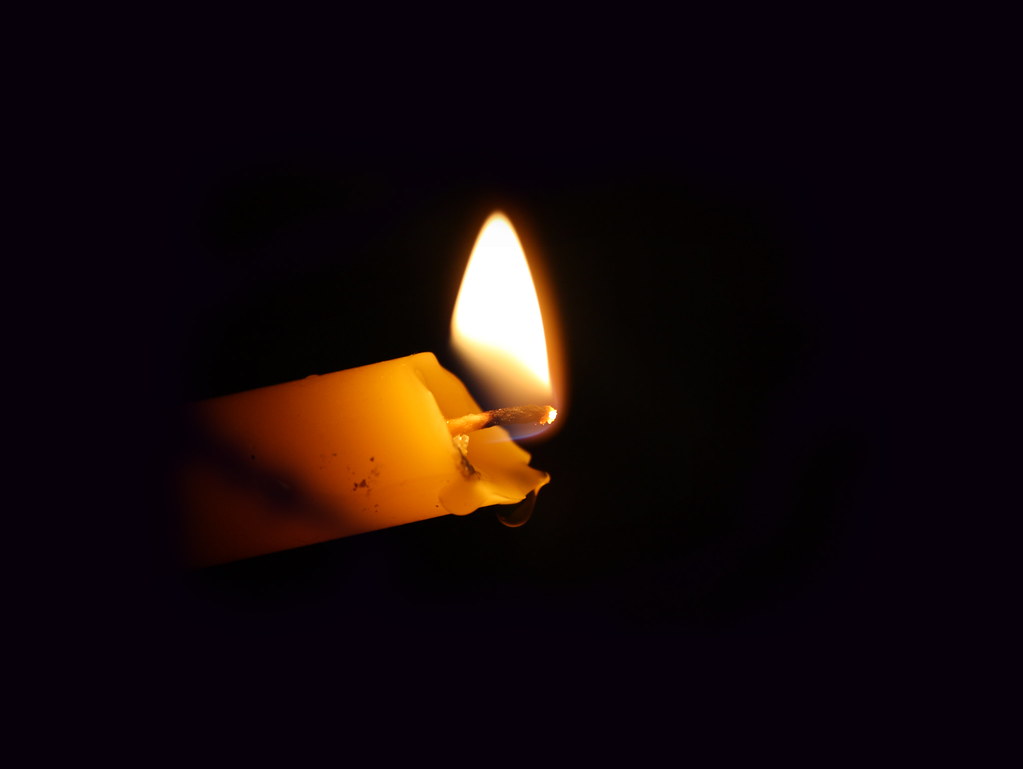 crying candle SHEREEN S. ABDUL KAREEM Flickr