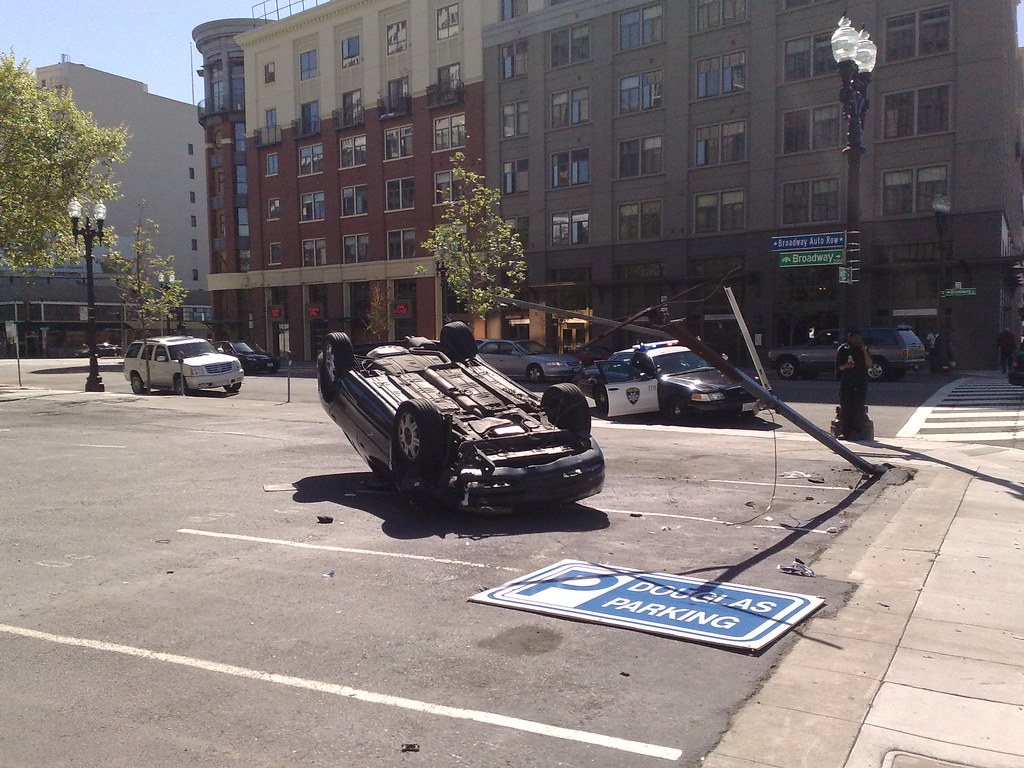 Flipped car at 23rd and Broadway (i) Kelly Flickr