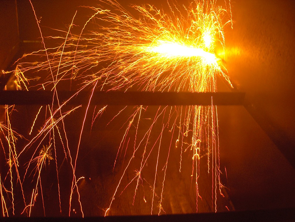 Oil Tank Dad using an angle grinder tu cut the oil tank in… Flickr