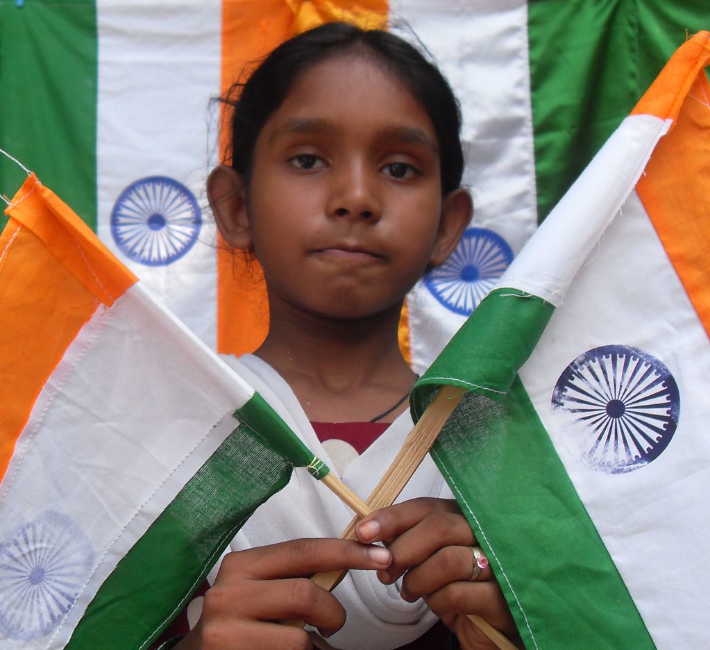 Flag girl [Photo by Mudassir Rizwan, Two Circles