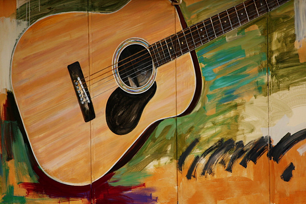 Guitar A mural on a wall outside a shop in the Bricklight … Flickr