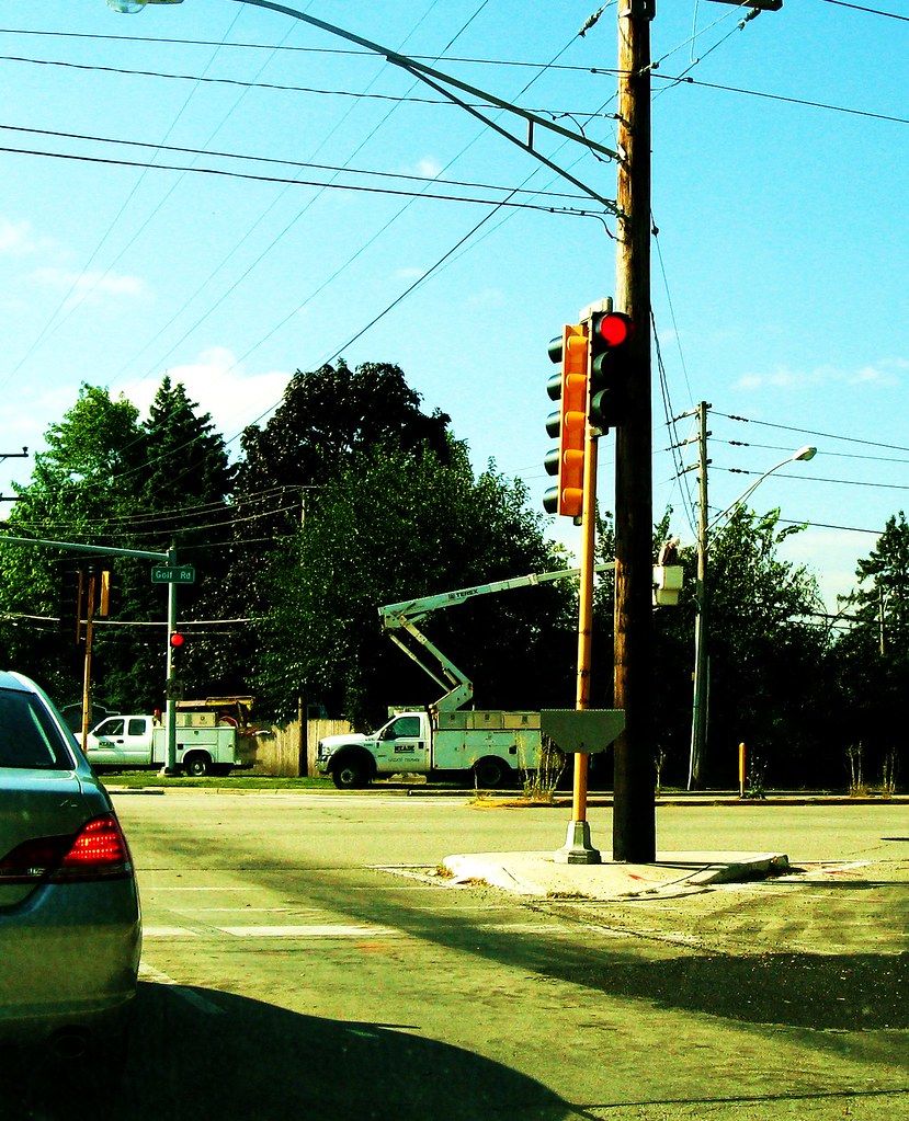 Meade Electric Company contractors working at the intersec… Flickr