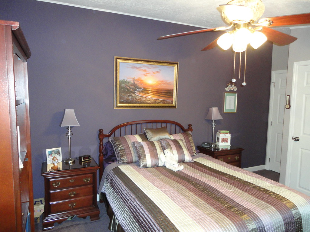 Bedroom Custom dark plum accent wall to highlight bedding