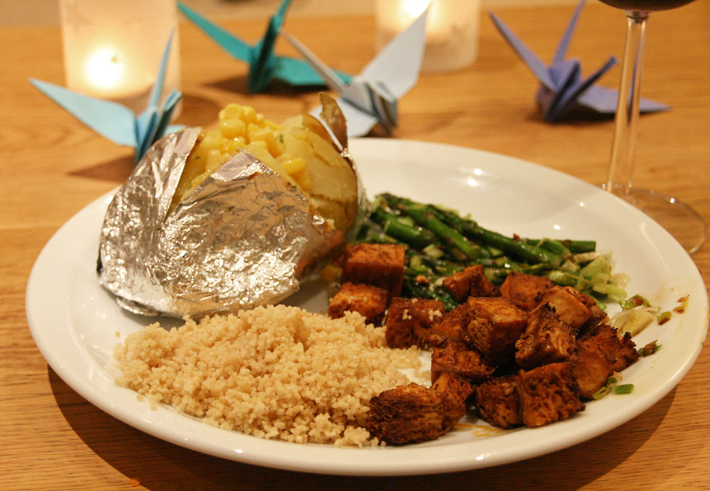 Marinated tofu with baked potato, couscous and asparagus Flickr