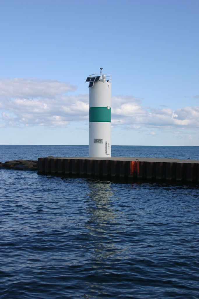 North lighthouse, Pentwater channel, calm morning A calm m… Flickr