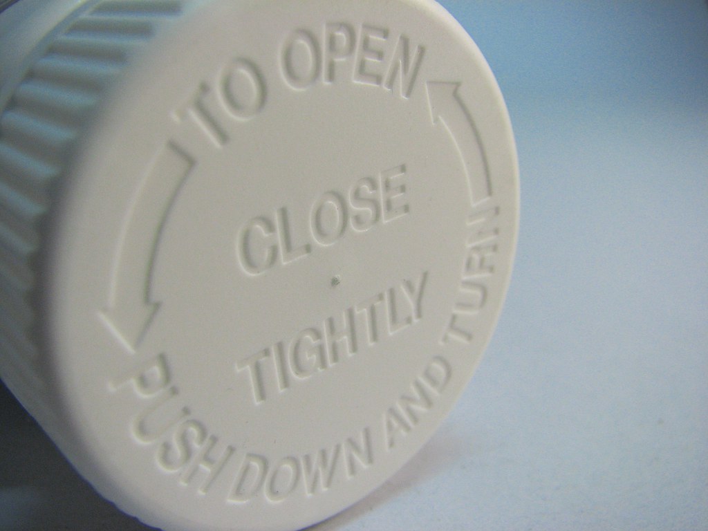 Child proof cap Instruction on a child proof cap of a bott… Flickr