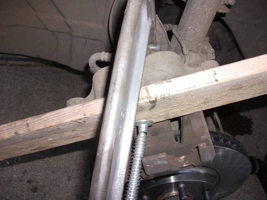 Push piston back in to caliper Push the two pistons back i… Flickr