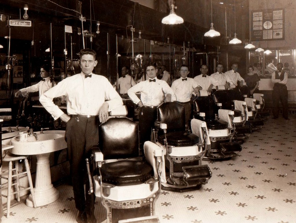 Back in the days when uniformed barbers were de rigeur Flickr