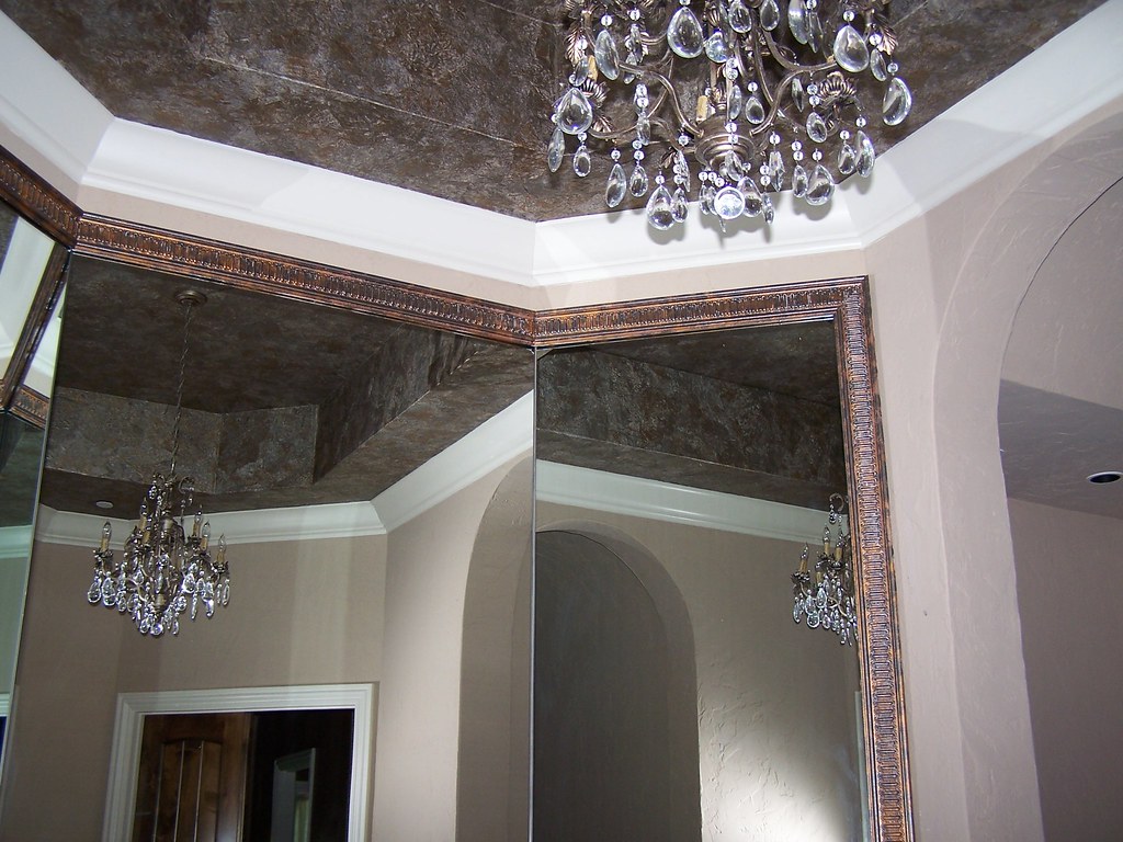 Octagonal Crown Moulding and Trim around Mirrors precisioncarpenter