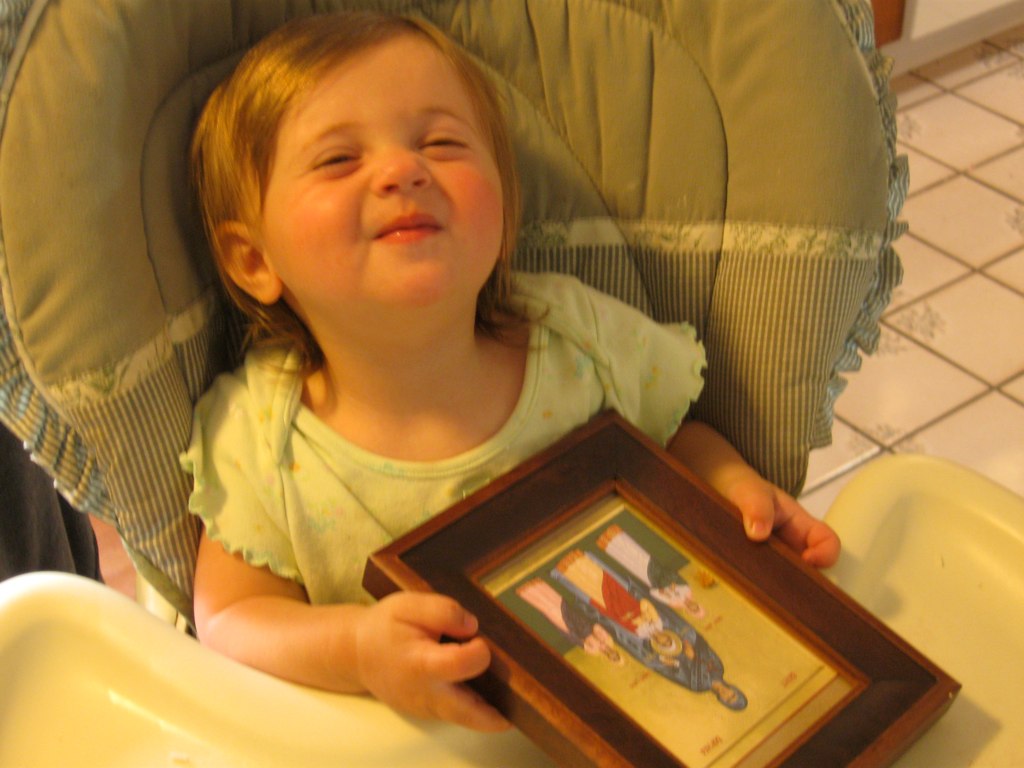 Sophie with her icon of St Sophia and her daughters. Flickr