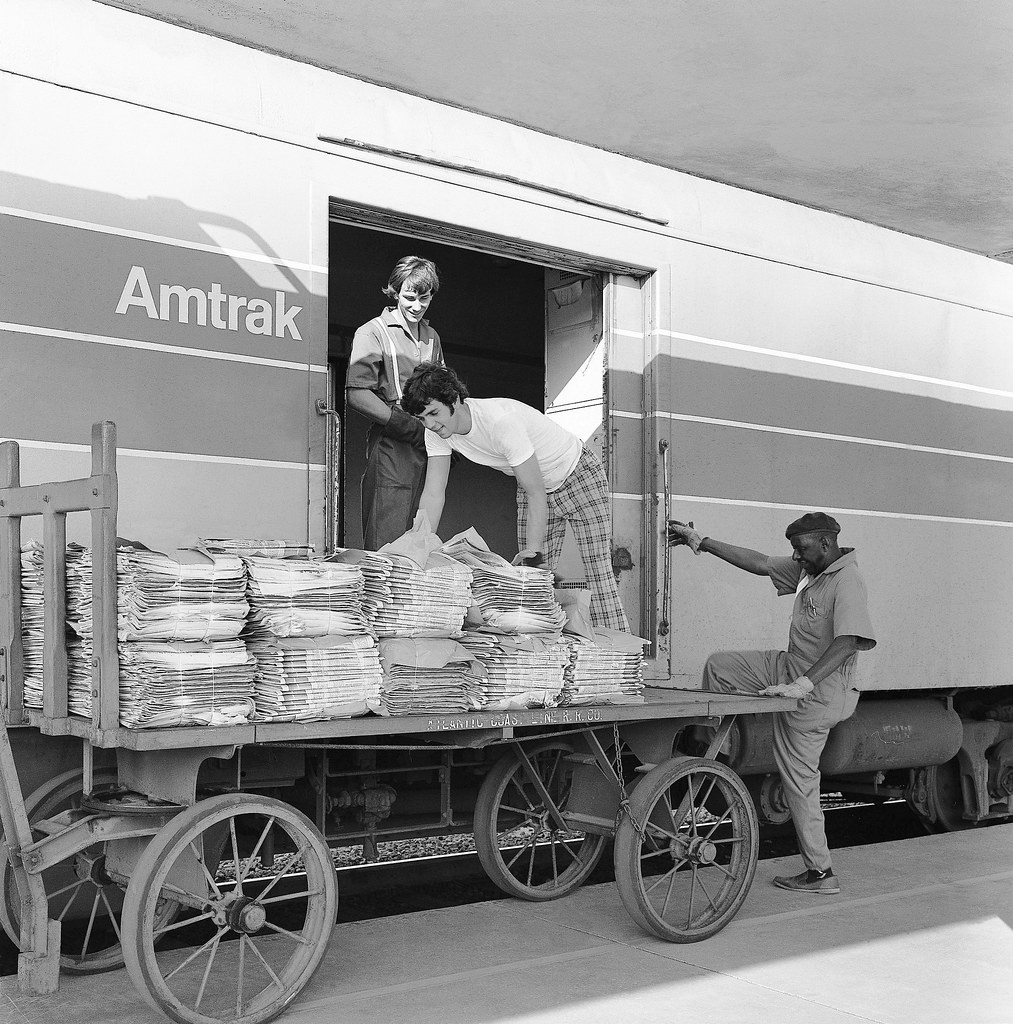 Amtrak baggage men are loading New York Times newspapers f… Flickr
