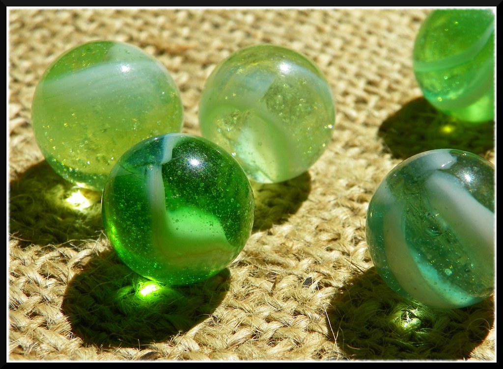 Vintage Peltier Marbles Some neat old greenish clear marbl… Flickr
