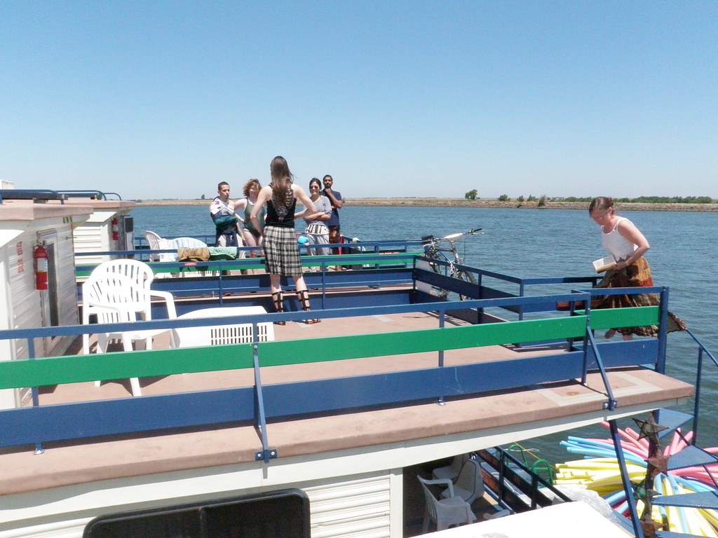 Hanging out on the houseboat roofs. Ratha Grimes Flickr