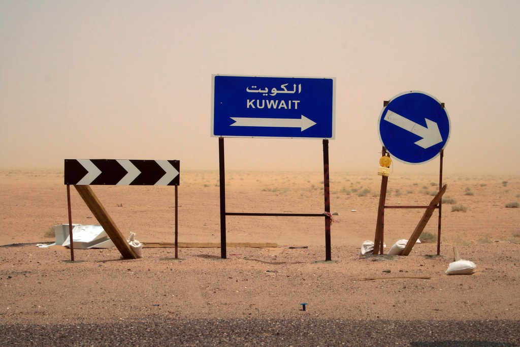 Kuwait this way ! Assorted road signs in the Kuwaiti deser… Bob