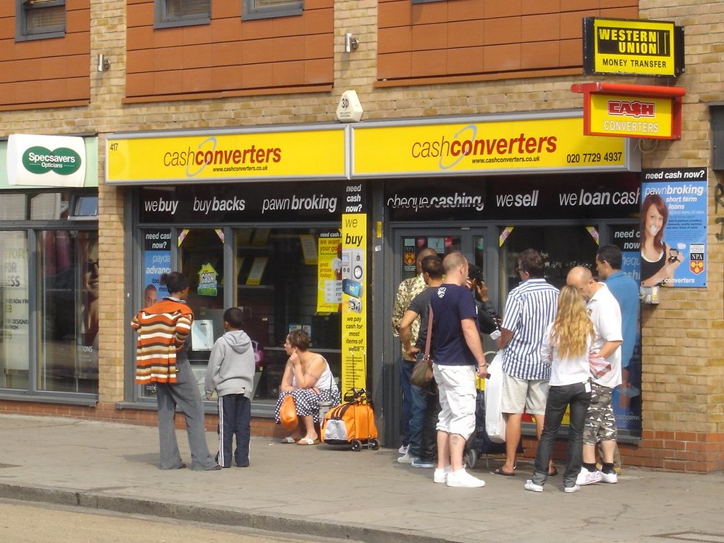 Waiting for Cash Converters to open. Bethnal Green Road, S… Flickr