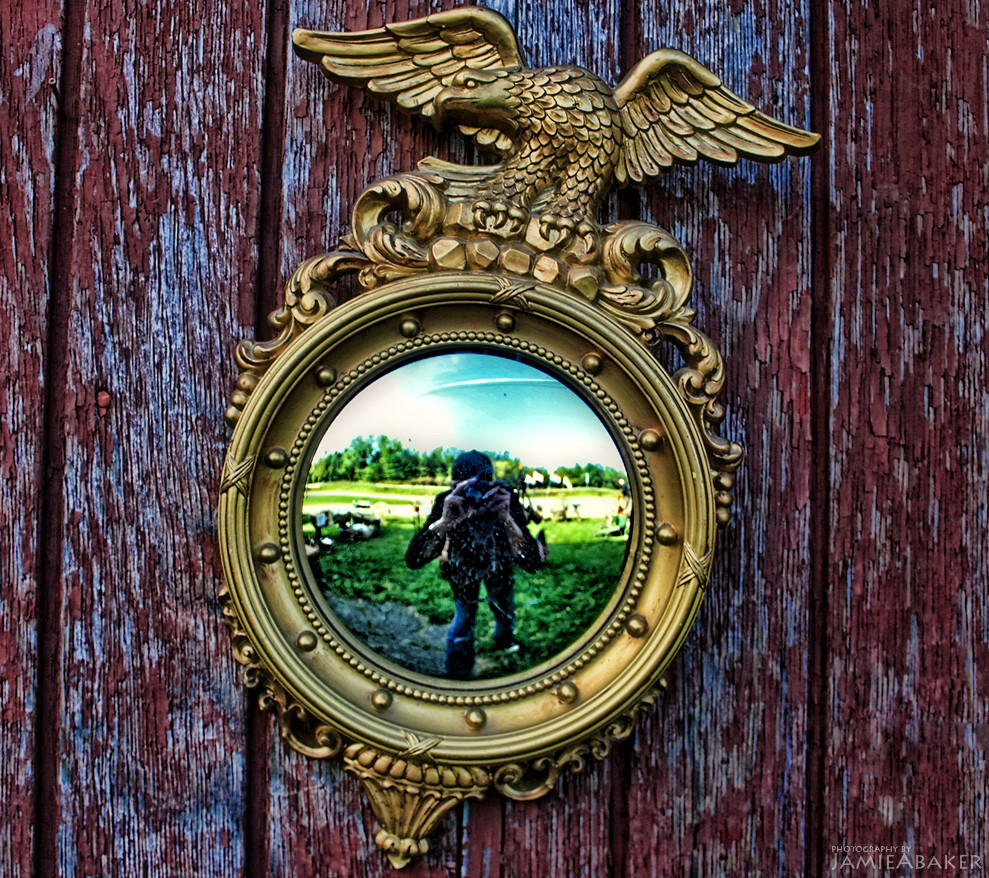 Antique Mirror An antique mirror hanging on the outside wa… Flickr