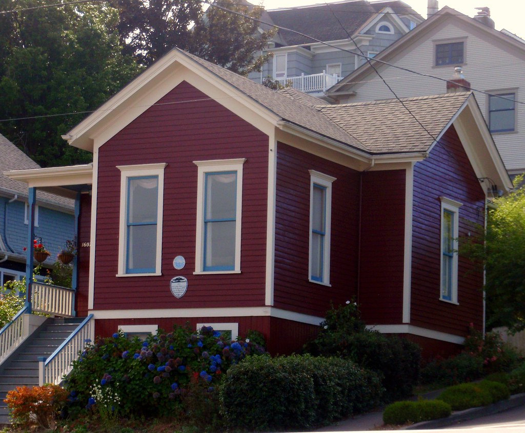 Burgundy red, beige, and blue Victorian house, Astoria, Oregon a