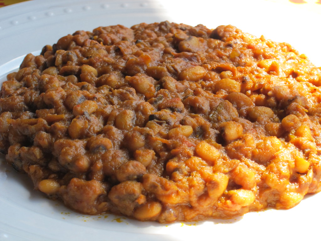 Beans cooked in palm oil Part of the redred combo at Maqu… Flickr
