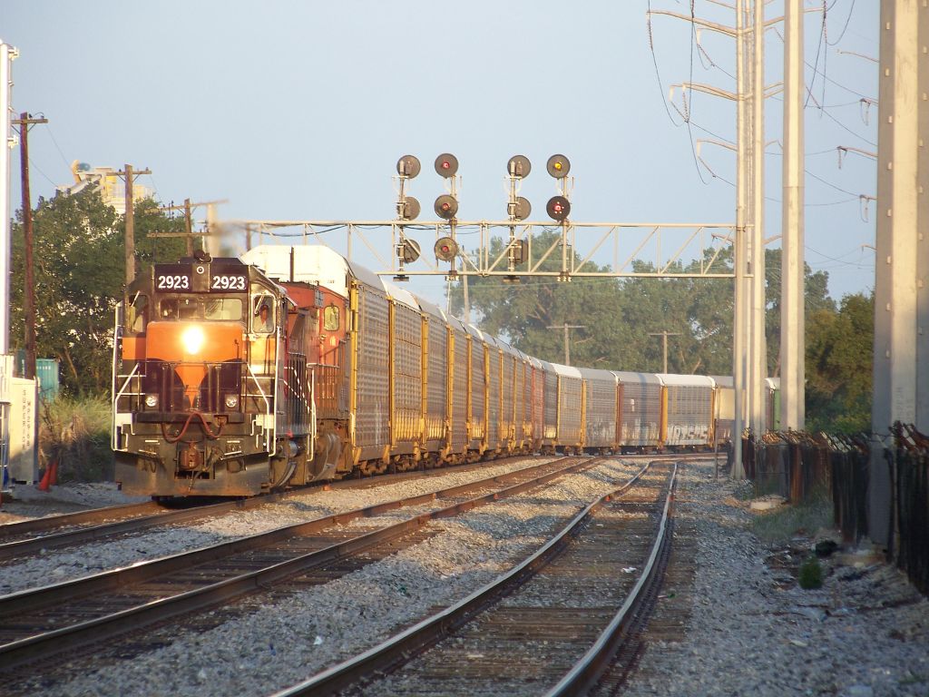 Classic IHB IHB SD20 2923 leads a auto train west through … Flickr