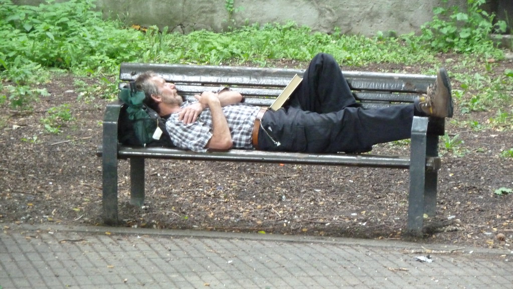 Sleeping man at Parc MivilleCoutoure Cary BassDeschenes Flickr