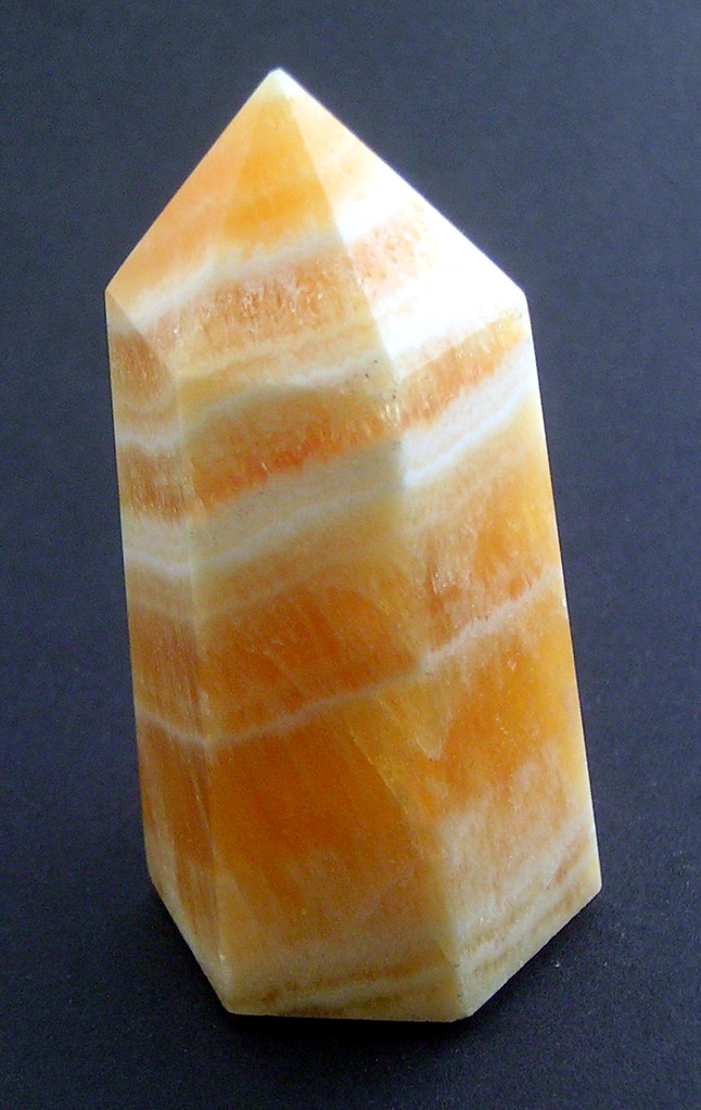 Orange calcite Cut and polised pillar of stripped calcite … Flickr