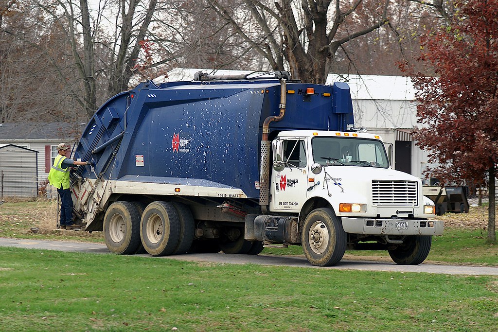 Trash Day The local trash truck on trash pickup day. Which… Flickr
