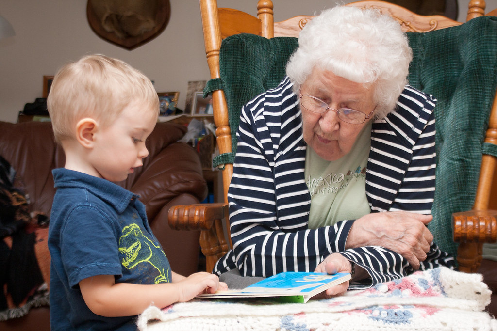 Reading Colin reading a book with GreatGrandma Sylvia. 7/… Flickr