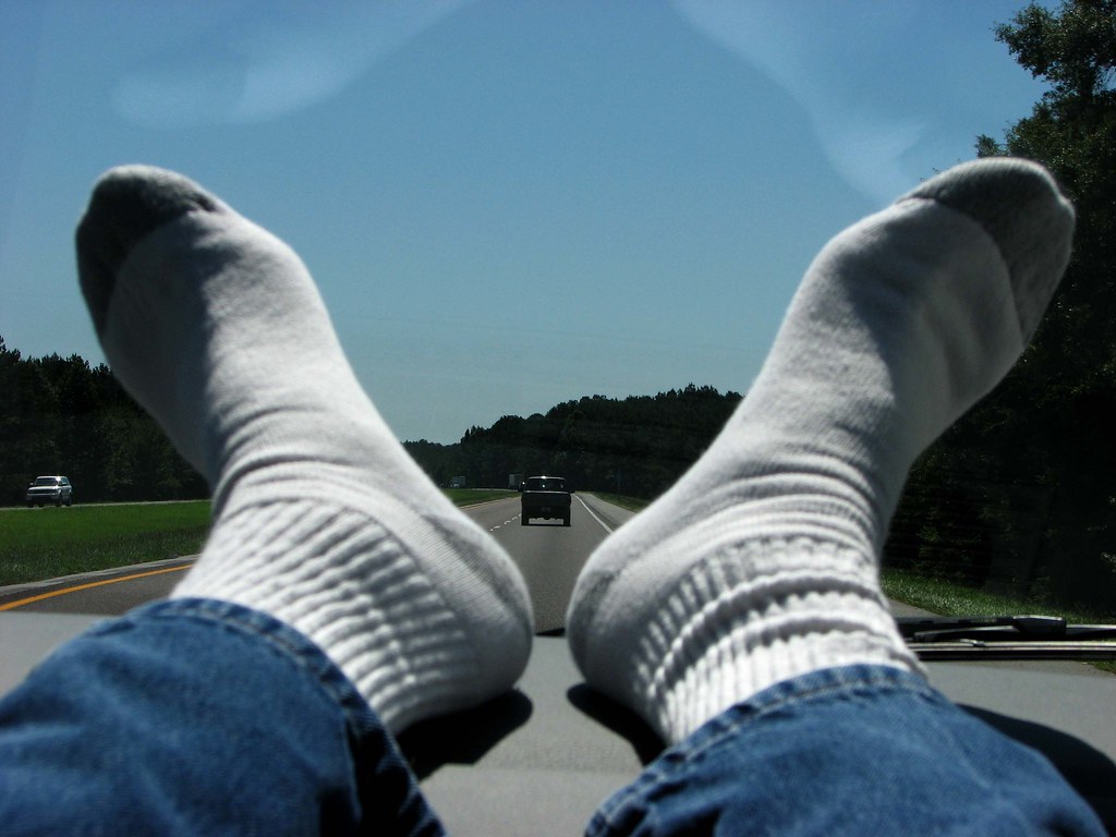 Traveling View Shoes off, feet up, camera ready, on the wa… Flickr